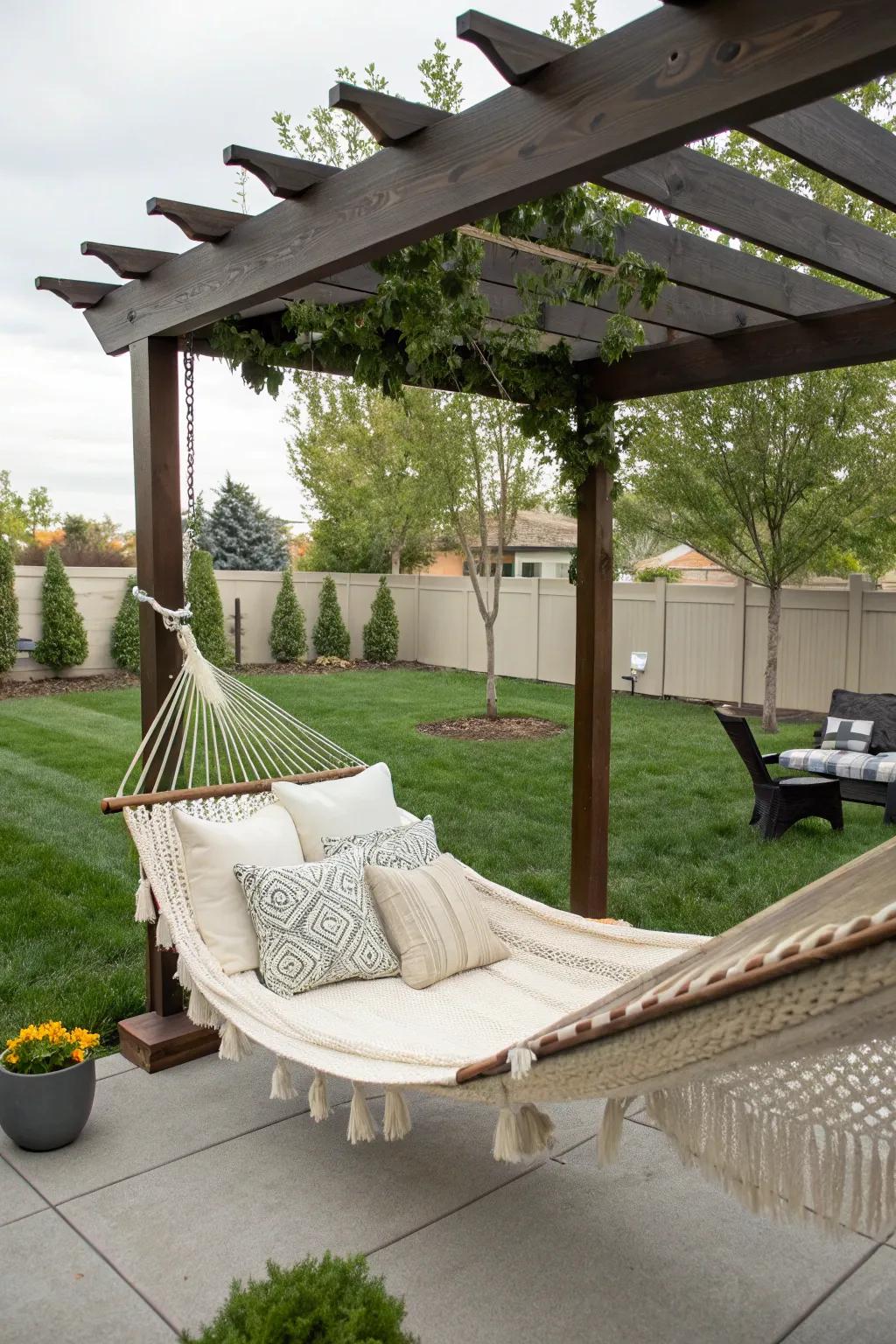 A relaxing hammock haven under a half pergola.