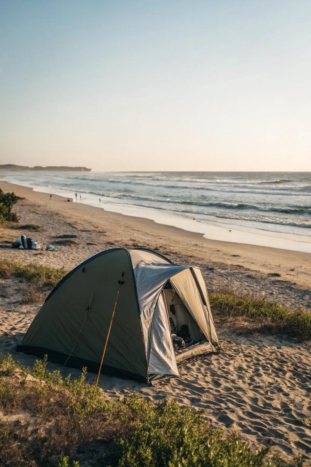 A romantic tent setup on a serene beach.
