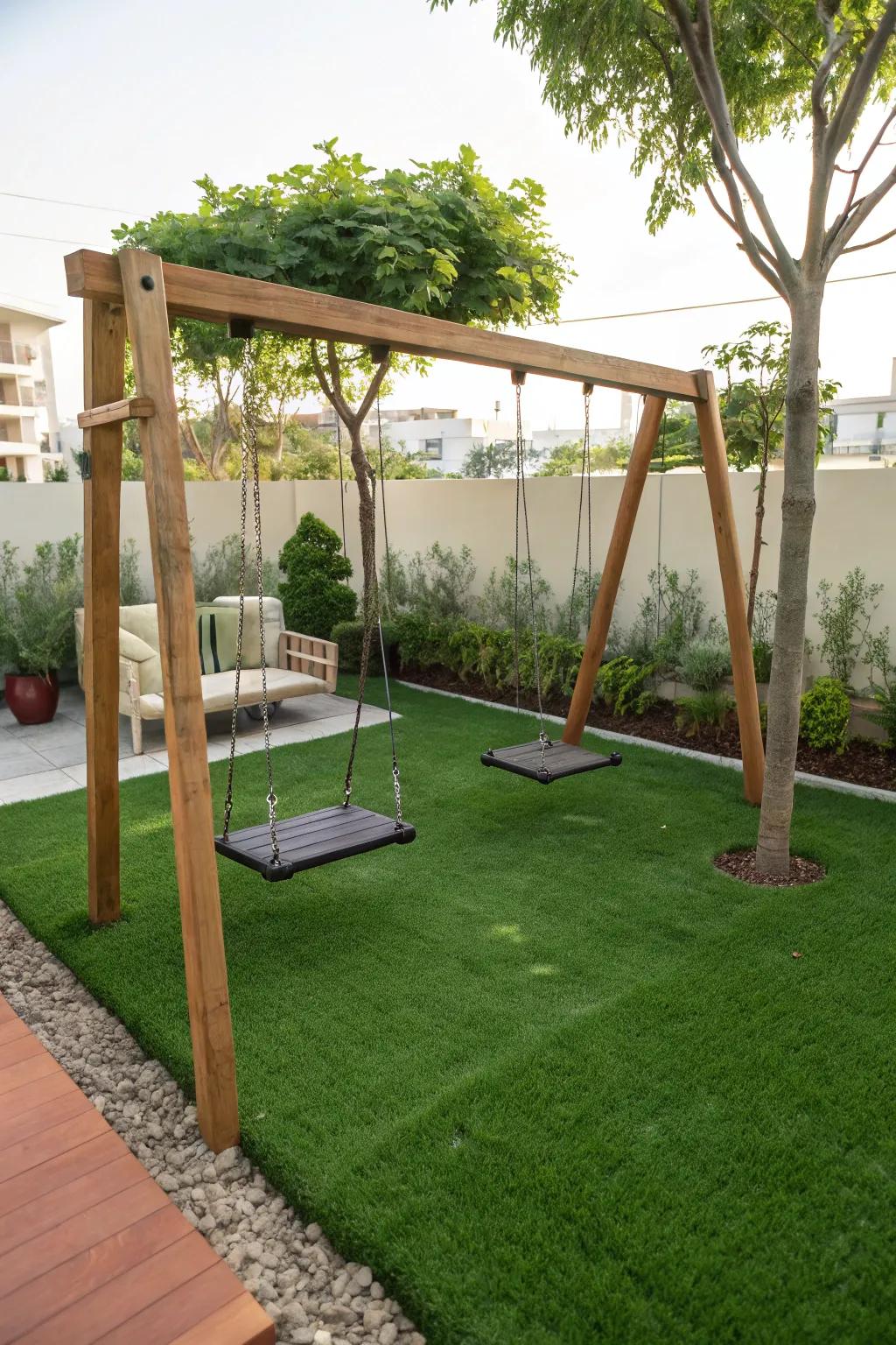 A backyard swing set set on a lush artificial turf base.