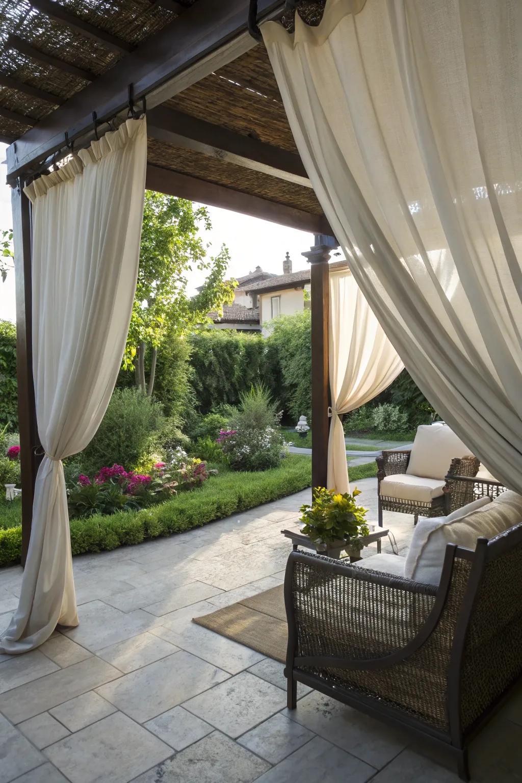 Outdoor curtains offer shade and a touch of elegance.