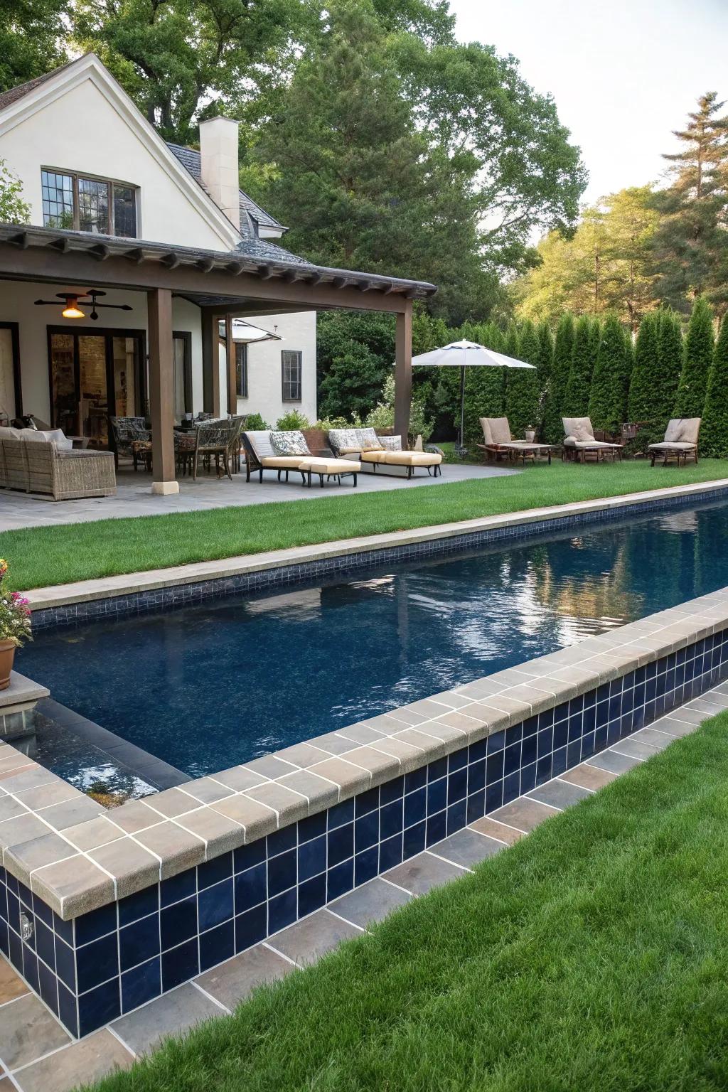 Deep navy tiles add drama and sophistication.