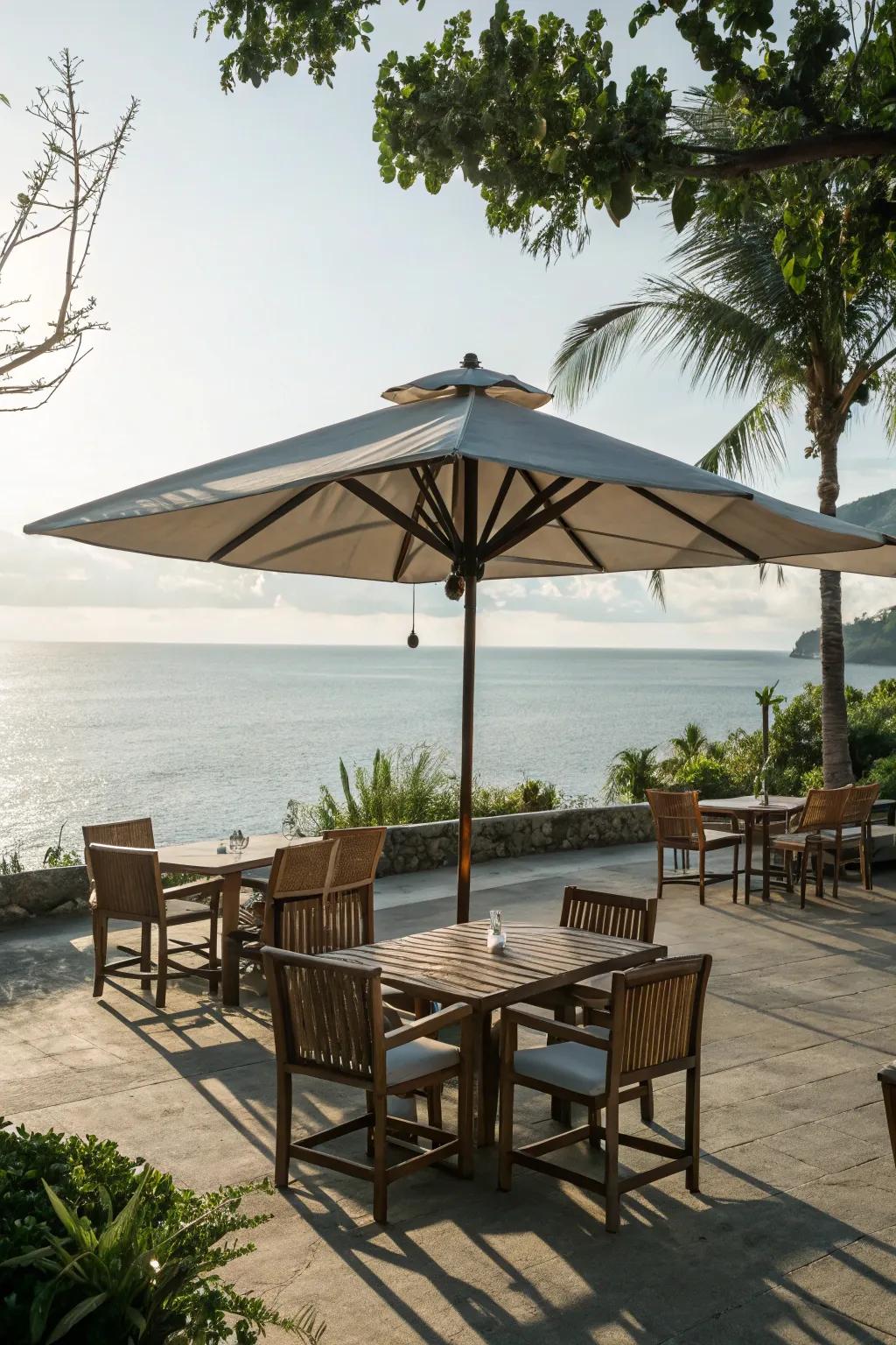 Umbrellas provide essential shade for a comfortable coastal patio.