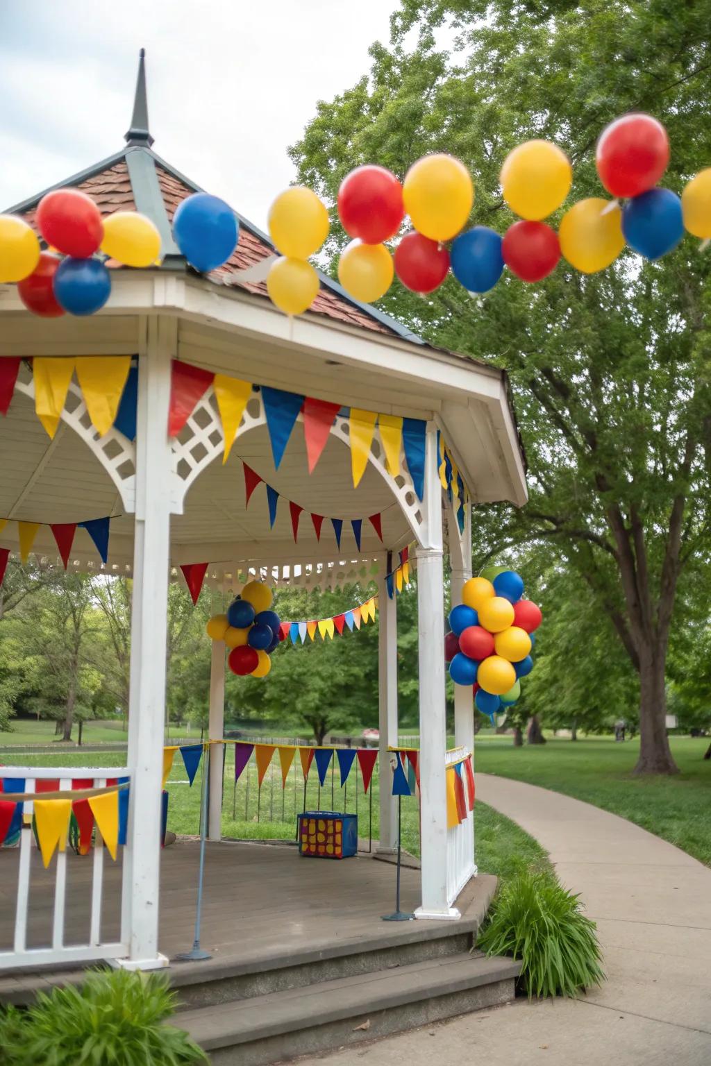 Balloons and banners adding a whimsical flair to a gazebo party.