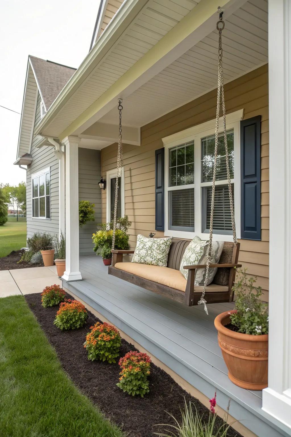 A front porch where decor colors match the home's exterior.