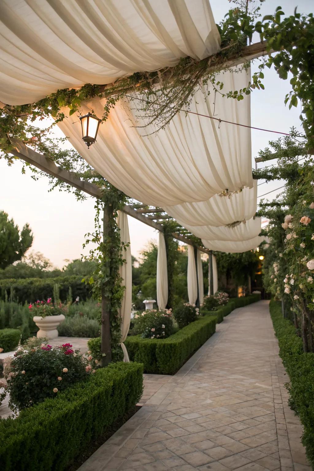 A fabric canopy creates a soft, elegant pergola ceiling.