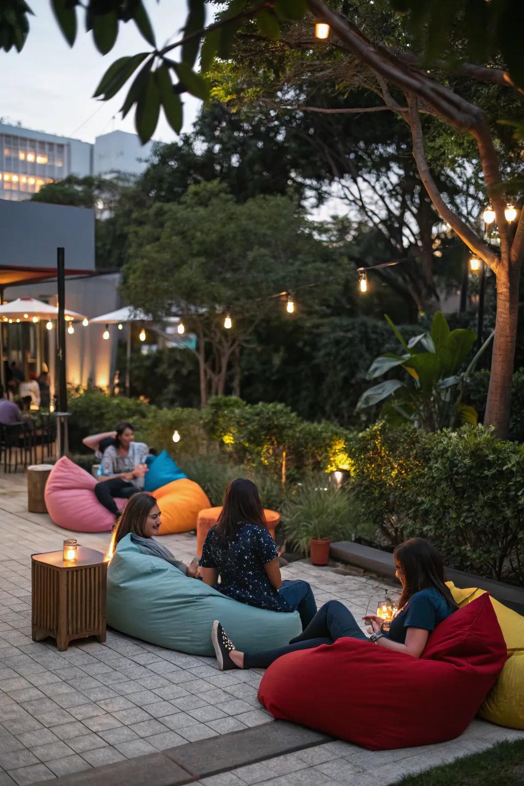 A chill zone by the pool with bean bags and soft lighting.