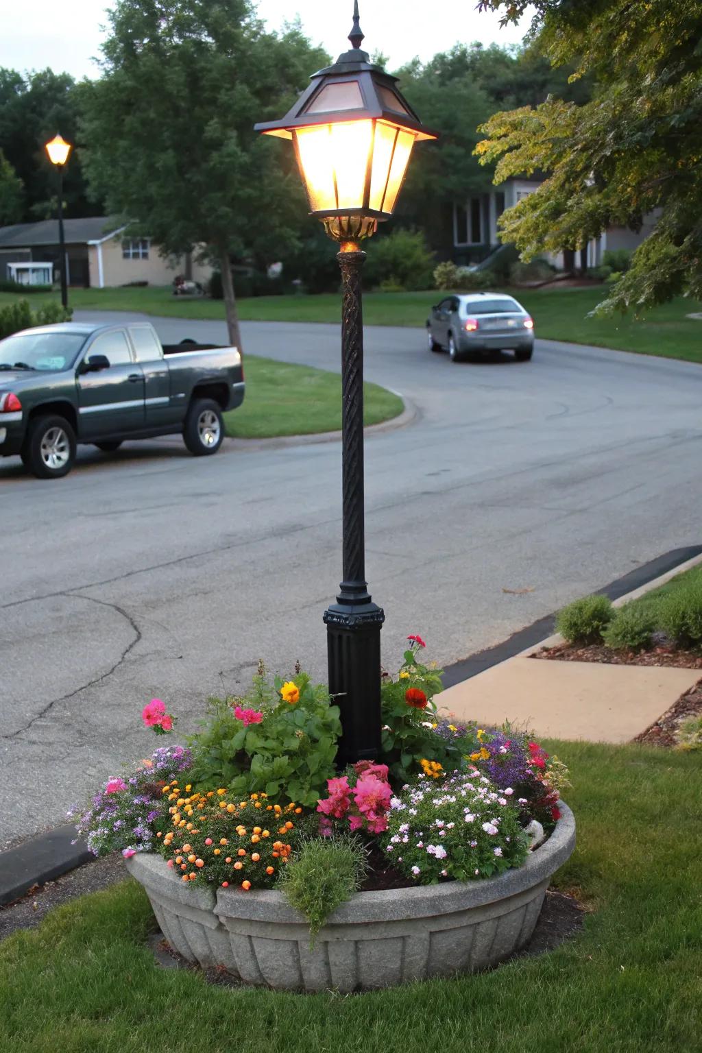 Planter base lamp post combines lighting with lush greenery.