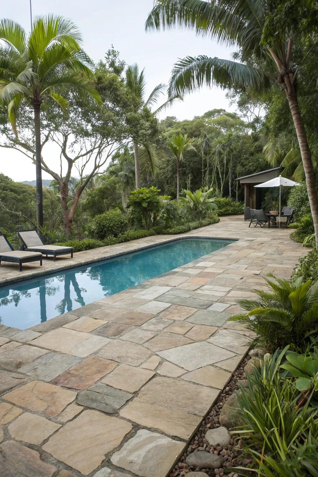 Natural stones add texture and elegance to the poolside.