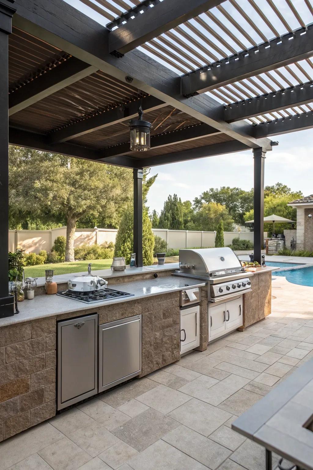 A pergola sheltering a convenient alfresco kitchen by the pool.