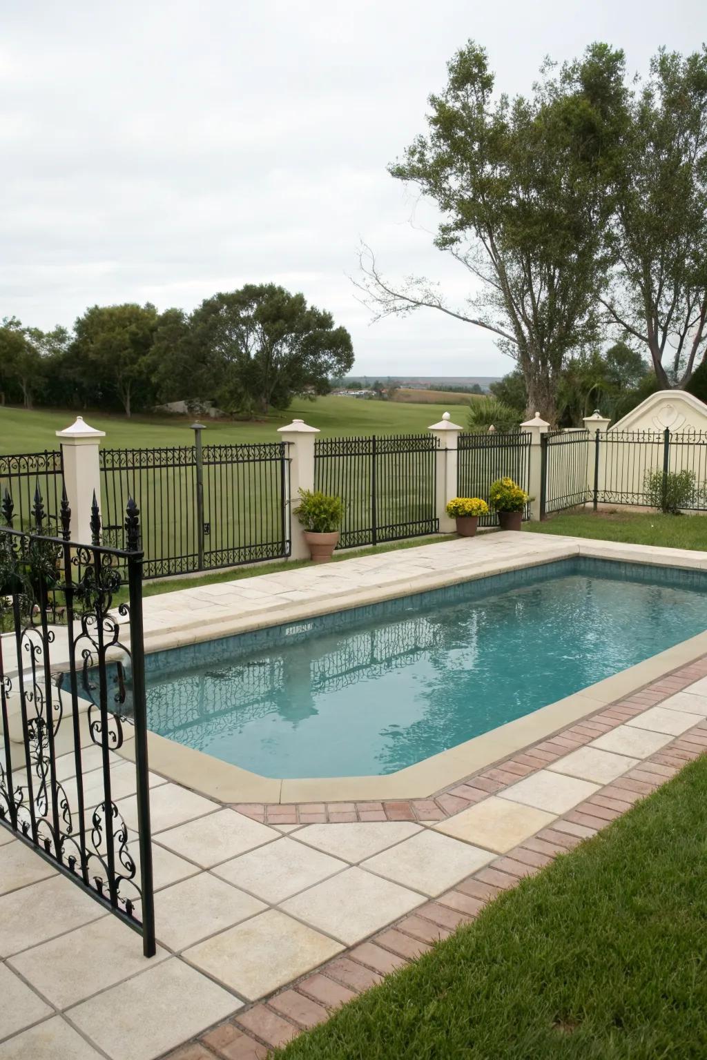 Decorative fencing adding privacy and flair to a small pool.