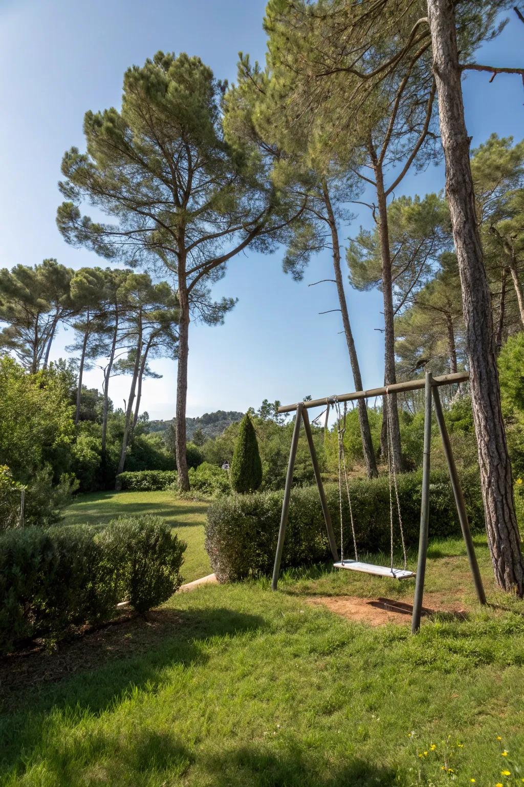 Swingset nestled in a private, tree-surrounded nook.