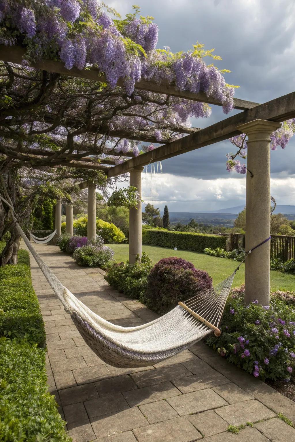 A relaxing hammock spot enveloped by the lush blooms of wisteria.