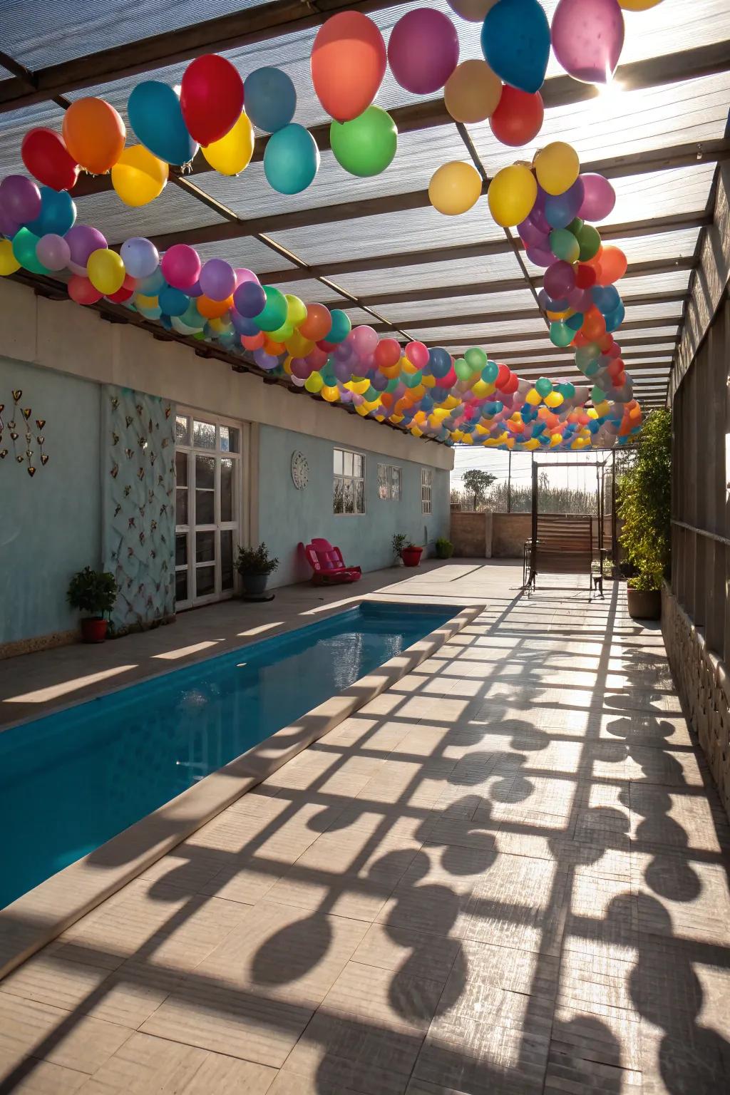 A balloon ceiling transforms the pool area into a whimsical wonderland.