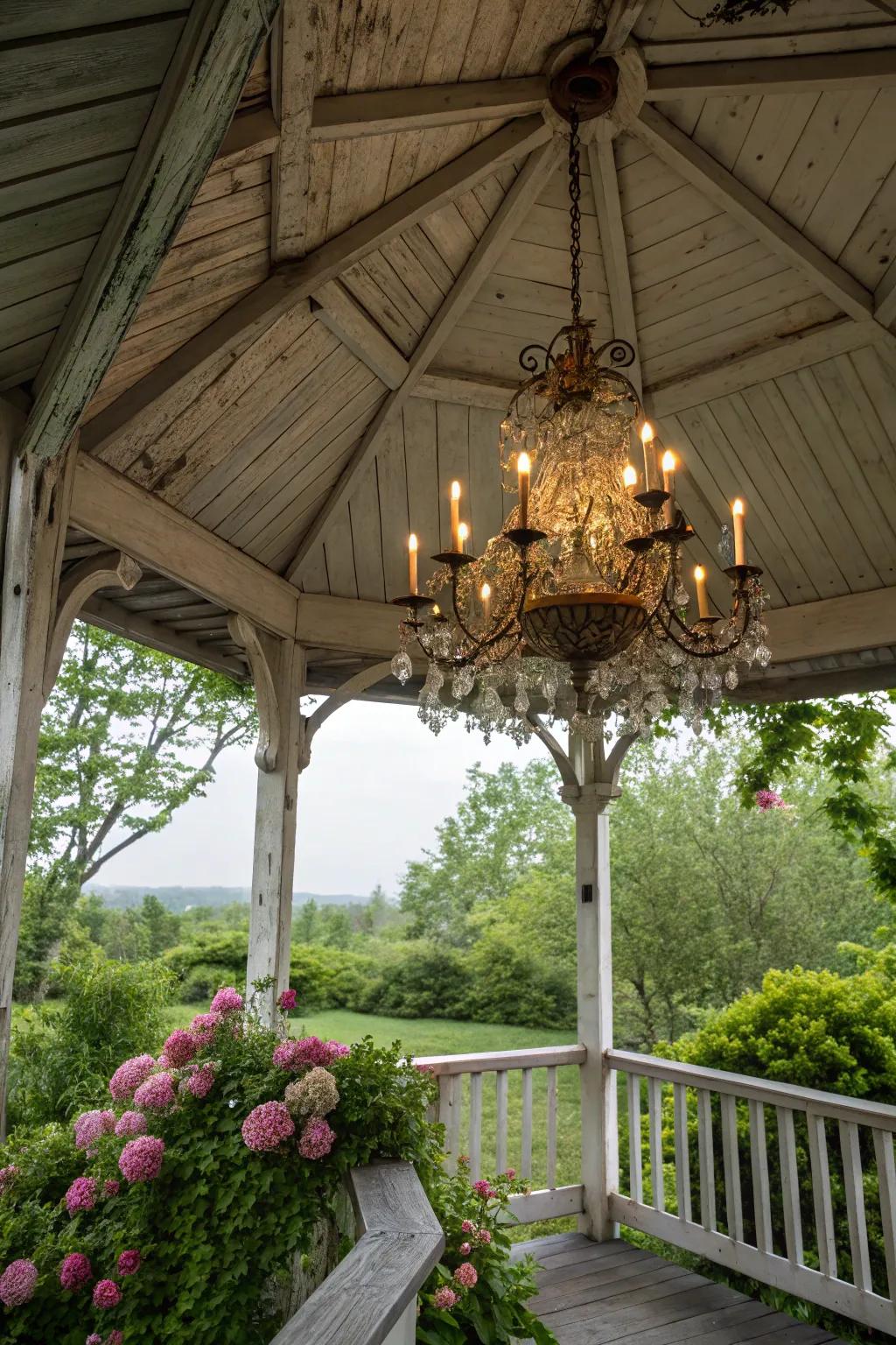An antique chandelier adds a touch of vintage charm to this gazebo.