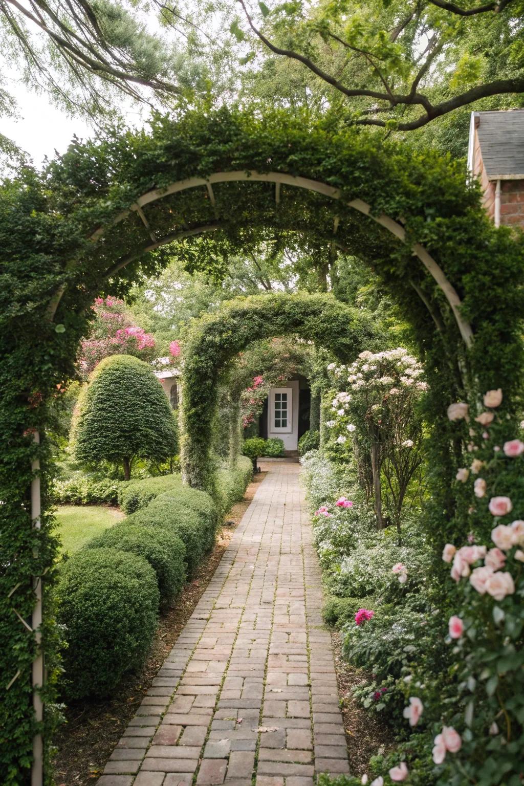 Boxwood arches create a grand entrance.