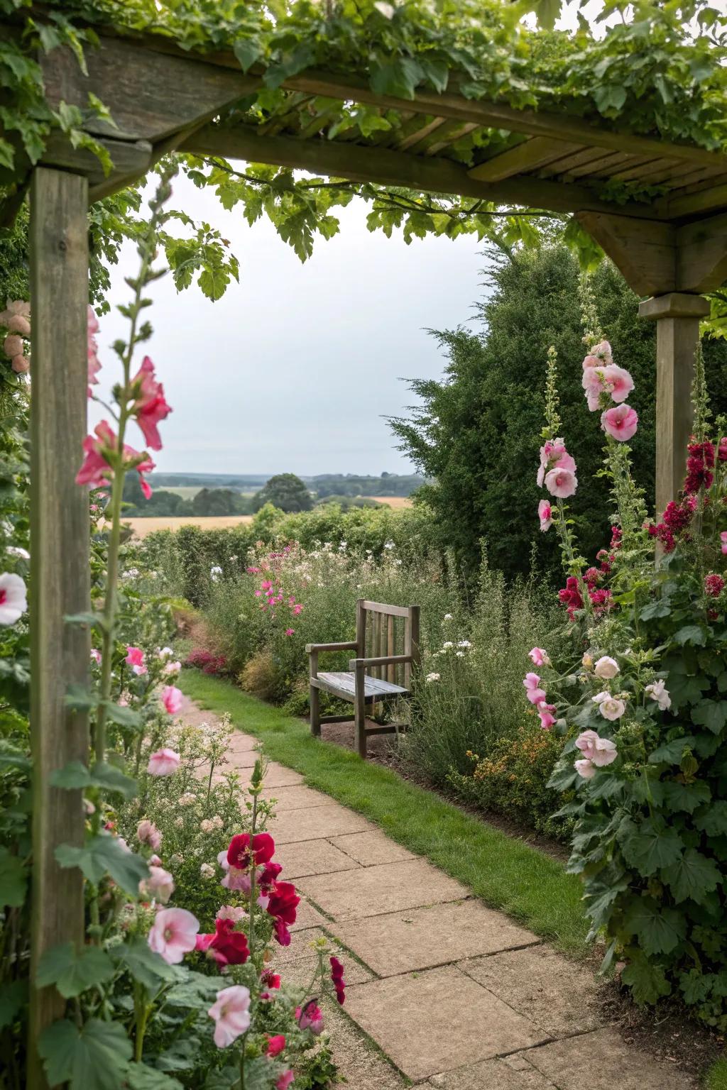 A secret garden nook enveloped by towering hollyhocks.