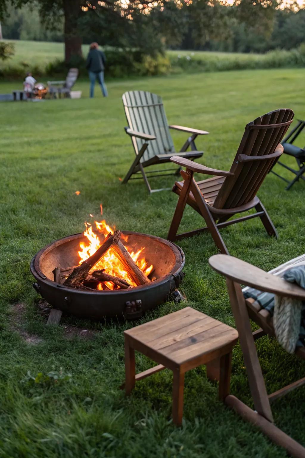 A cozy fire pit bringing warmth to a grassy setting.
