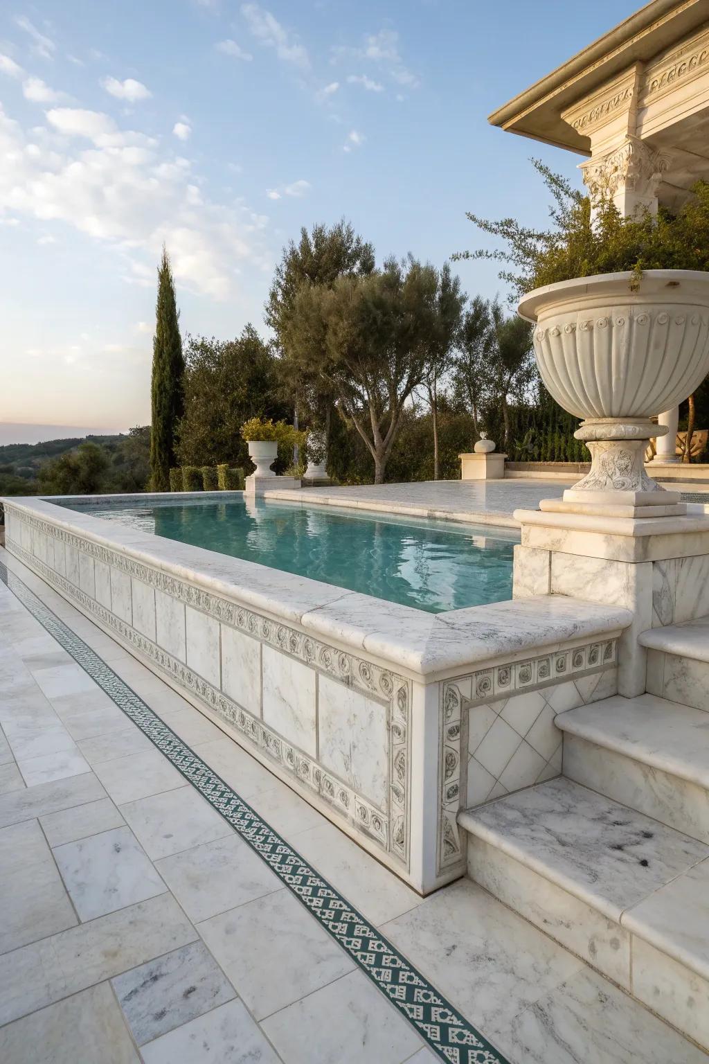 Polished marble accents add luxury to pool edges.