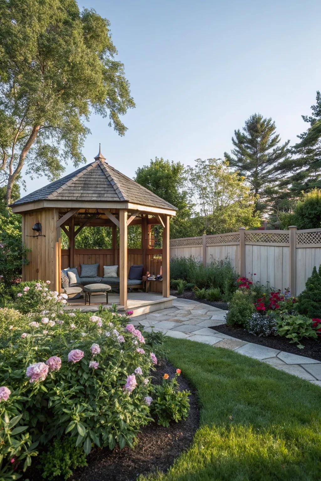A compact pavilion tucked into the corner of a small backyard.